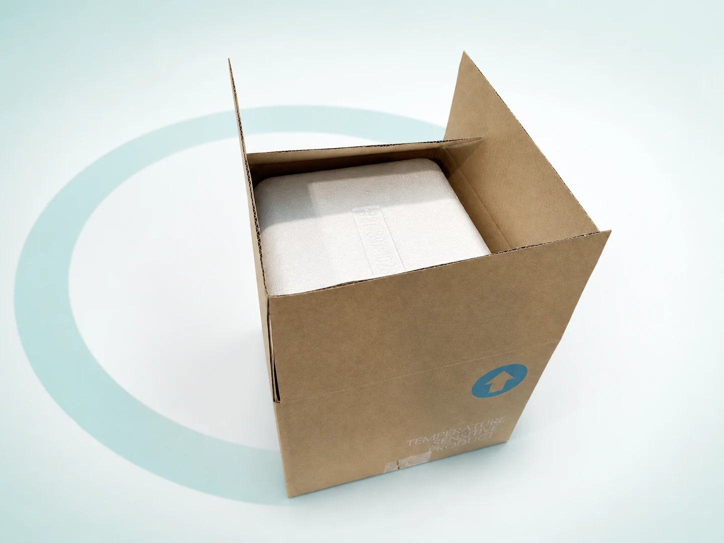 Open insulated pharmacy delivery box with its fitted white foam cold-container insert